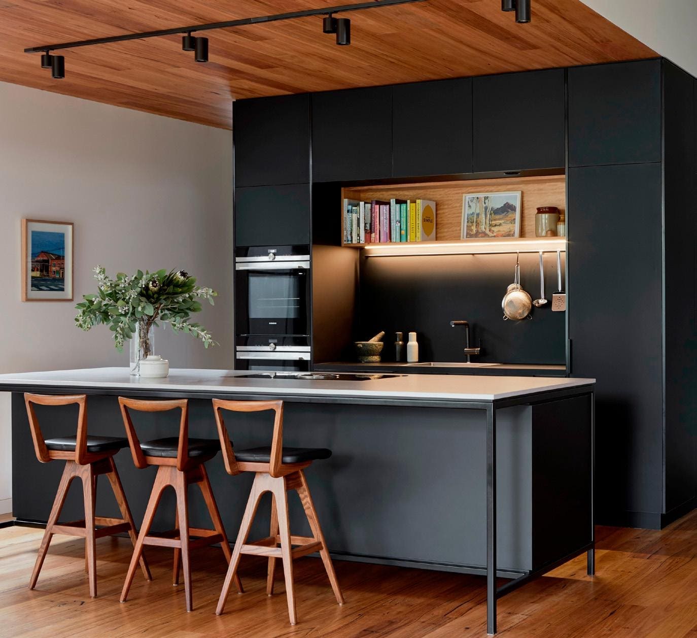 Kitchen Cabinet Suite — Navy Island with Wood Bar Stools